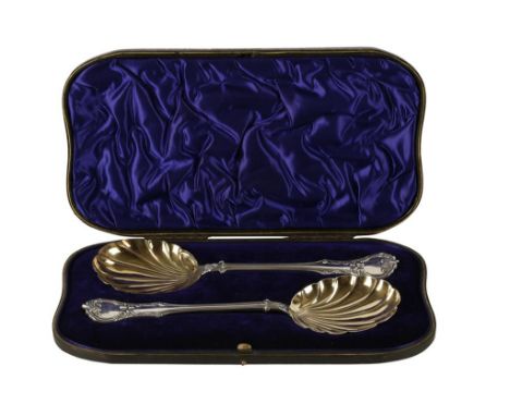 PAIR OF VICTORIAN SILVER PARCEL-GILT SERVERS by William Hutton and Sons, London, 1899 in fitted blue velvet lined presentatio