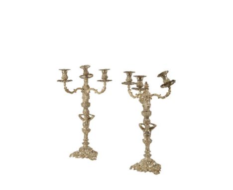 PAIR OF THREE-LIGHT SILVER CANDELABRA by Garrard & Co., London 1978, the triangular cast bases decorated with grapevines and 