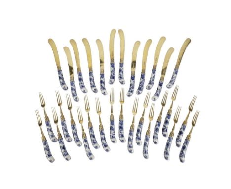 PART VICTORIAN SILVER GILT AND PORCELAIN MOUNTED SET OF DESSERT EATERS, the ceramic handles decorated with a Meissen 'Blue On