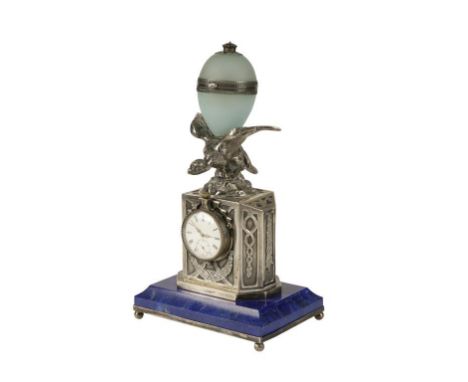 AMERICAN SILVER AND LAPIS LAZULI TABLE CLOCK the white enamel dial with Roman numerals and subsidiary seconds dial, with top 