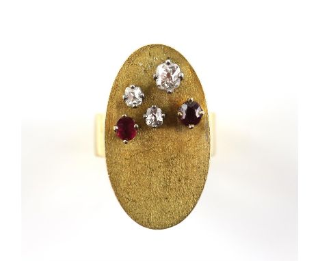 Asymmetric gold ring, set with three old cut diamonds, estimated total diamond weight 0.62 carats, with two round cut rubies,