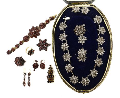 19th C cut steel floral necklace, with concealed clasp, 34cm in length, with matching brooch, a pair of earrings with later c