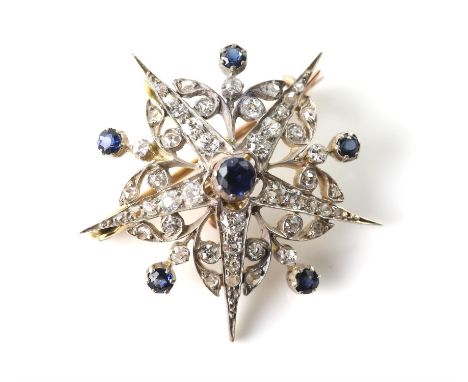 Victorian sapphire and diamond floral star brooch, set with a central round cut sapphire and old cut and rose cut diamond set