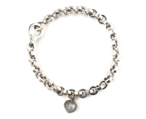 Chopard Happy Diamonds bracelet, heavy belcher link bracelet with a suspended diamond heart with a single collet set floating