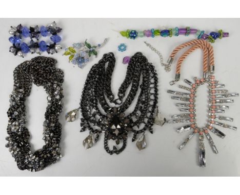 Large selection of modern costume jewellery, including large necklaces, faux pearl necklaces, earrings, bracelet, floral broo