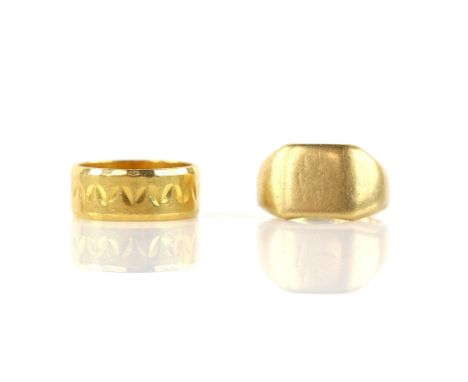 Two rings, a 1980's textured wedding band, in 22 ct, ring size P and a 1950's square signet ring, inside engraved ' With Love