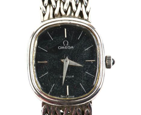 Omega , a Ladies De Ville wristwatch  the oval case with signed black dial, and silvered hour markers, fitted  with a calibre