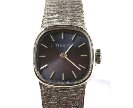 Tissot, A ladies white gold wristwatch, the signed blued dial with baton hour markers, fitted with a calibre 2403 17 jewel ma