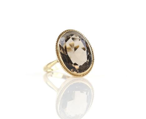 Smokey quartz cocktail ring, estimated weight 4.49 carats, ring size K, mounted in 9 ct yellow goldCondition Report:  9 ct we