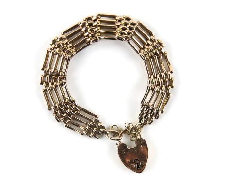 Gold gate link bracelet, with heart padlock clasp and safety chain, in 9 ct hallmarked Birmingham 1906, 19cm in lengthConditi