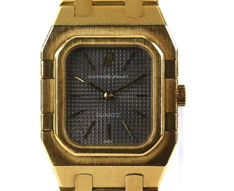 Audemars Piguet a Ladies Royal Oak gold wristwatch, the stepped case with octagonal bezel, the signed grey dial with gold bat