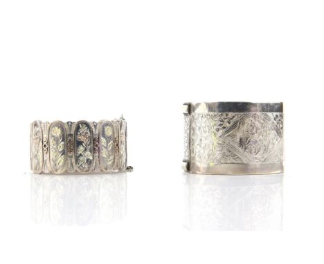 Victorian silver cuff bangle, ornate floral detail and wave cut out edge, 3.2cm in with, with concealed clasp and safety chai