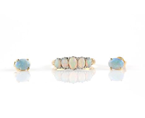 Vintage opal five stone ring, set with five graduated oval cabochon cut opals, largest opal 5.4 x 3.6mm, mount testing as 14 