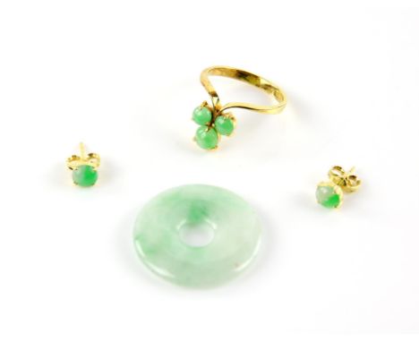 Jade circular disc, with a green hard stone set trefoil ring, size M 1/2, and a pair of matching circular cabochon earrings w