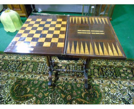 A 19th Century Rosewood Work Table with fold-open chess board and cribbage top