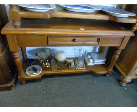 A Pine Side Table with Gallery Back, inset painted tile, turned legs with under-shelf. 53ins wide, 20th Century