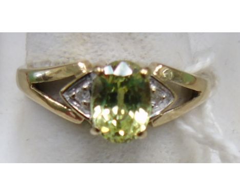 A 9ct Gold, Diamond &amp; Tourmaline Ring. Size N.