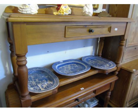 A Pine Side Table with Gallery Back, inset painted tile, turned legs with under-shelf. 53ins wide, 20th Century
