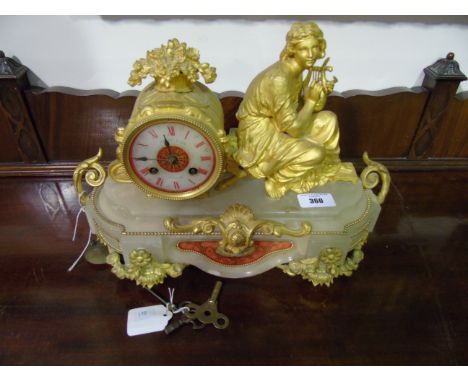 19th Century French Gilt Spelter and Alabaster Mantel Clock having figural decoration depicting a seated muse, alabaster dial