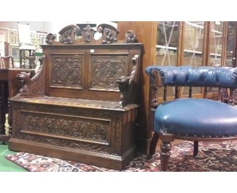 A Late 19th Century Oak Hall Bench with lift up seat 42ins wide. 