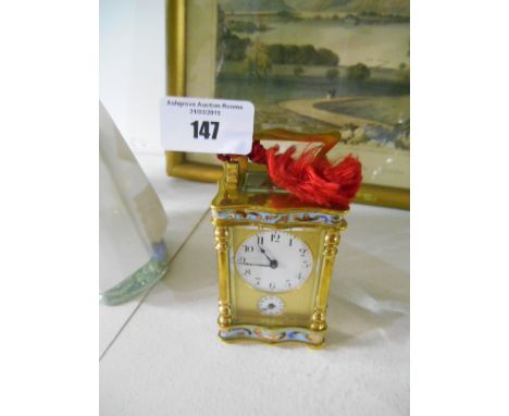 A French Brass & Enameled Carriage Clock with the Key. 10.5cm to include handle upright