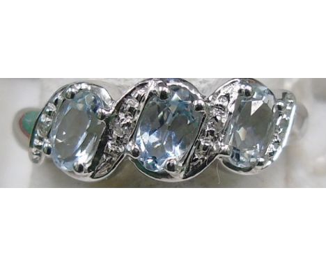 A 9ct Diamond &amp; Aquamarine Ring. Size L.
