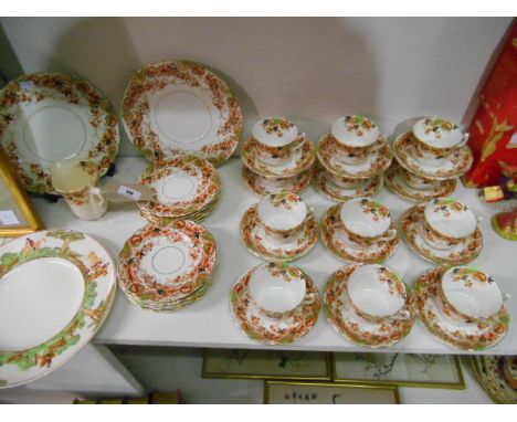 Early 20th Century Sutherland China Twelve Person Tea Service having gilt highlighted foliate decoration (lacking sugar)