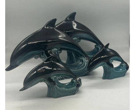 A group of Dolphins by Poole pottery 