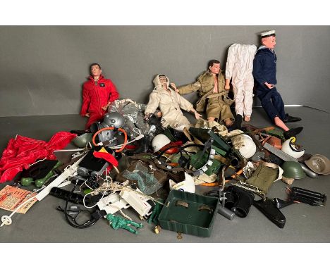 A selection of vintage early Action Men and a large quantity of accessories, clothes, guns and helmets 