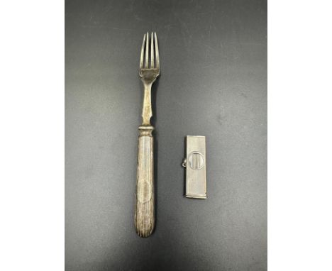 Two silver items, a cigar cutter hallmarked for Birmingham and a fork, weighing 13.4g and 52.1g respectively 