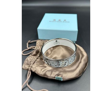 A Halcyon Days enamel bangle, snakeskin themed in original box with paperwork 