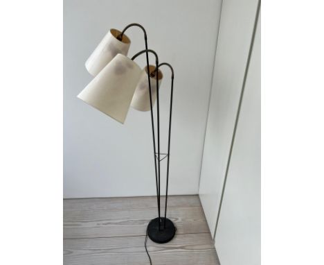 A three arm floor lamp, brass and black enamelled stem with articulated three arm lamps possibly Danish  (H176cm)