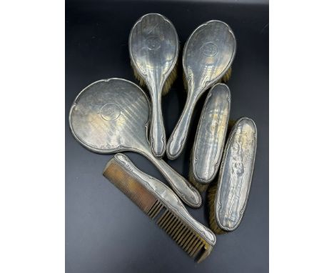 A six piece silver dressing table brush and comb set, hallmarked for Birmingham 1921 by Robert Pringle & Sons