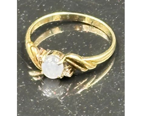 A moonstone ring on a 14ct gold setting, marked 585