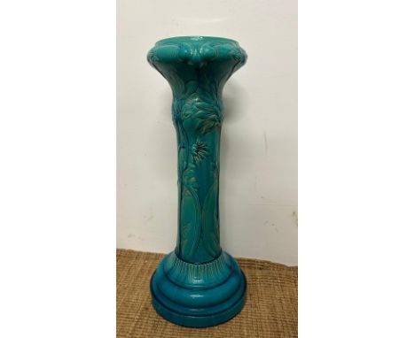 A Burmantofts turquoise/blue faïence jardinière with decorative floral detail (H81cm Dia35cm)