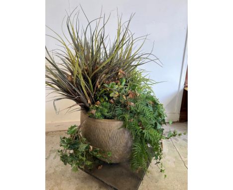 A large round ribbed planter with artificial perennial plants (H46cm)