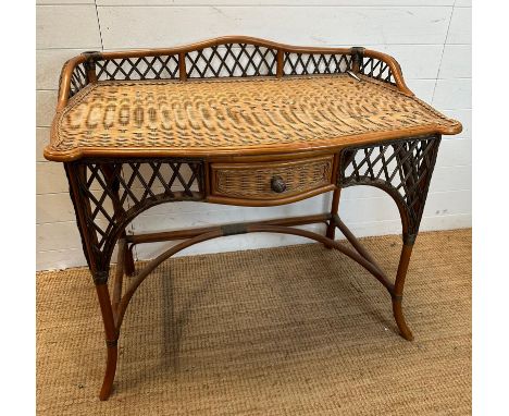 A vintage Ralph Lauren style two tone rattan writing table, single drawer and a galleried top (H88cm W102cm D58cm)