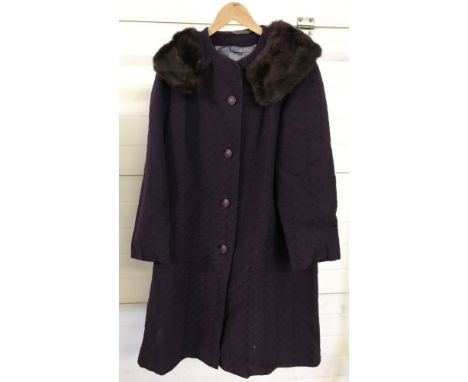  Fully lined with front button fastening. 