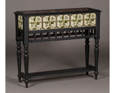A late Victorian Aesthetic period ebonized rectangular planter, the main body fitted with a metal liner, the sides inset with