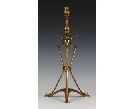 An Arts and Crafts brass table lamp, probably by W.A.S. Benson, the angular triform body united by a central sphere and an ar