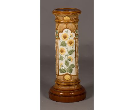 A Burmantofts art pottery sunflower pattern jardinière stand, late 19th Century, decorated in relief with panels of sunflower