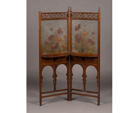 A late Victorian Arts and Crafts Moorish walnut framed folding 'Five o'Clock Tea-cup Screen' by Liberty & Co, fitted with mas