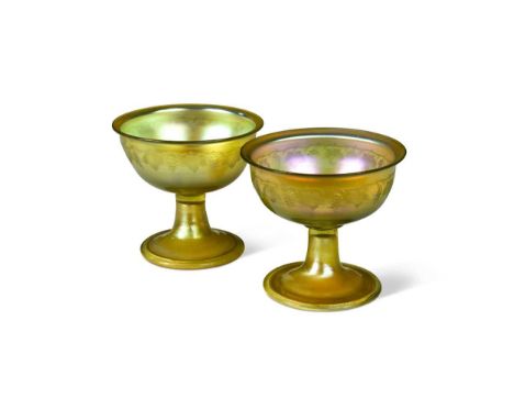 A pair of Tiffany Favrile glass sundae dishes, early 20th century, the glass bowls rising from circular spreading feet and ac