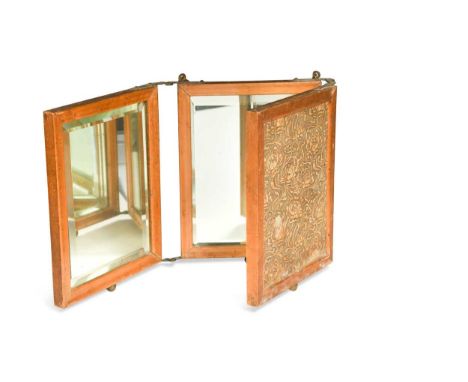 An Art Nouveau triple-plate folding travel mirror, the hinged triptych with embossed Morris-style leather to the exterior and