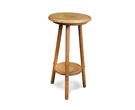 A Cotswold School oak cricket lamp table, the circular top on cylindrical supports united by an under-tier below74 x 37cm