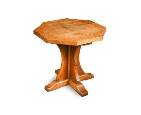 A Robert 'Mouseman' Thompson oak occasional table, the adzed top on cruciform column support with carved mouse signature47 x 