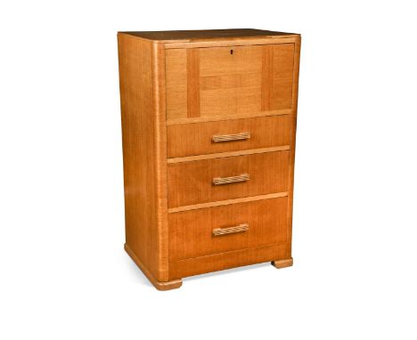 An Art Deco pale oak bachelor's chest, with a geometrically inlaid fall-front opening to reveal a pigeon holes and a writing 