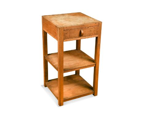 A Cotswold School pale oak occasional or lamp table in the manner of Heals, circa 1930, the quarter-veneered oak top above a 