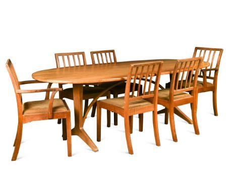 § Edward Barnsley CBE (1900-1987) and The Barnsley Workshop, a large walnut dining table and eight chairs, the wishbone table