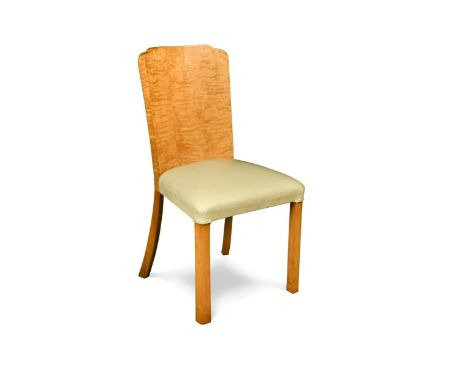 An Art Deco satin walnut side chair, the shaped solid back over a cream leather upholstered seat89 x 47 x 49cm